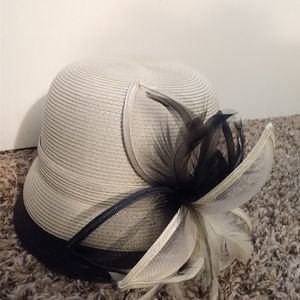 Fine millinery by August hat